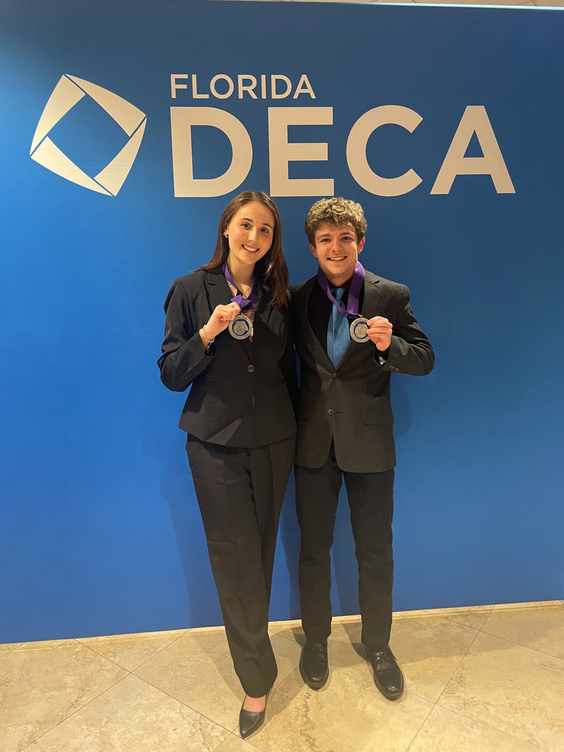 Marketing seniors, Austin Lankford and Sofia McIntosh receive Scholarships at DECA State Conference